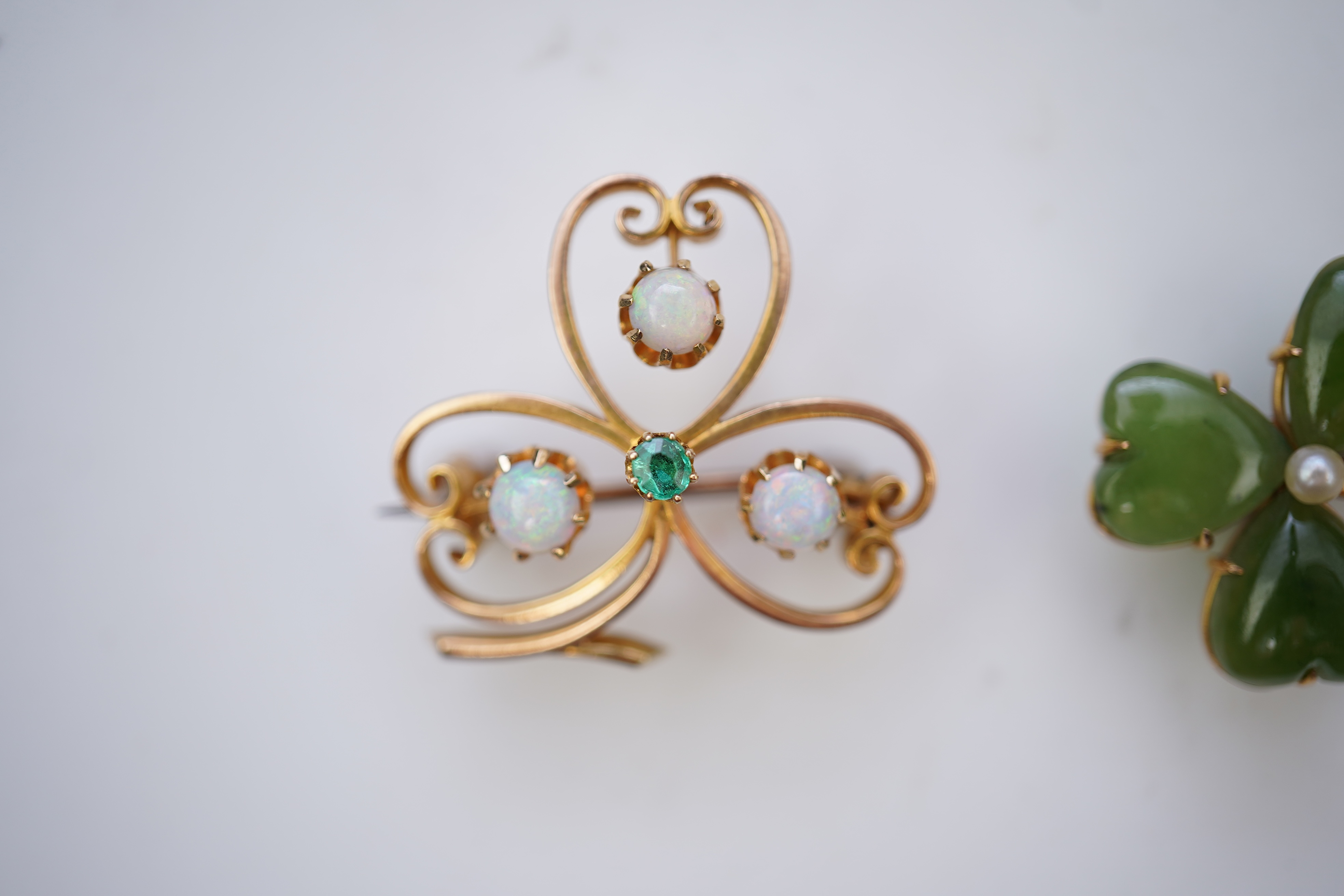 Two gem-set brooches